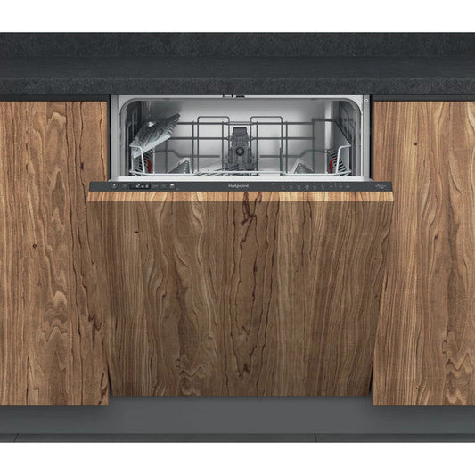 Integrated dishwasher in a modern wooden kitchen with open door and visible racks, showcasing efficient cleaning design – dishwashers Northern Ireland
