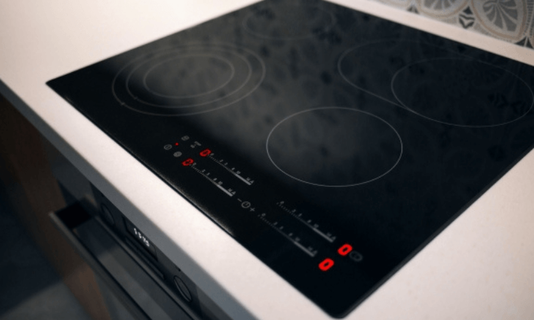 image of a electric stove turned on.