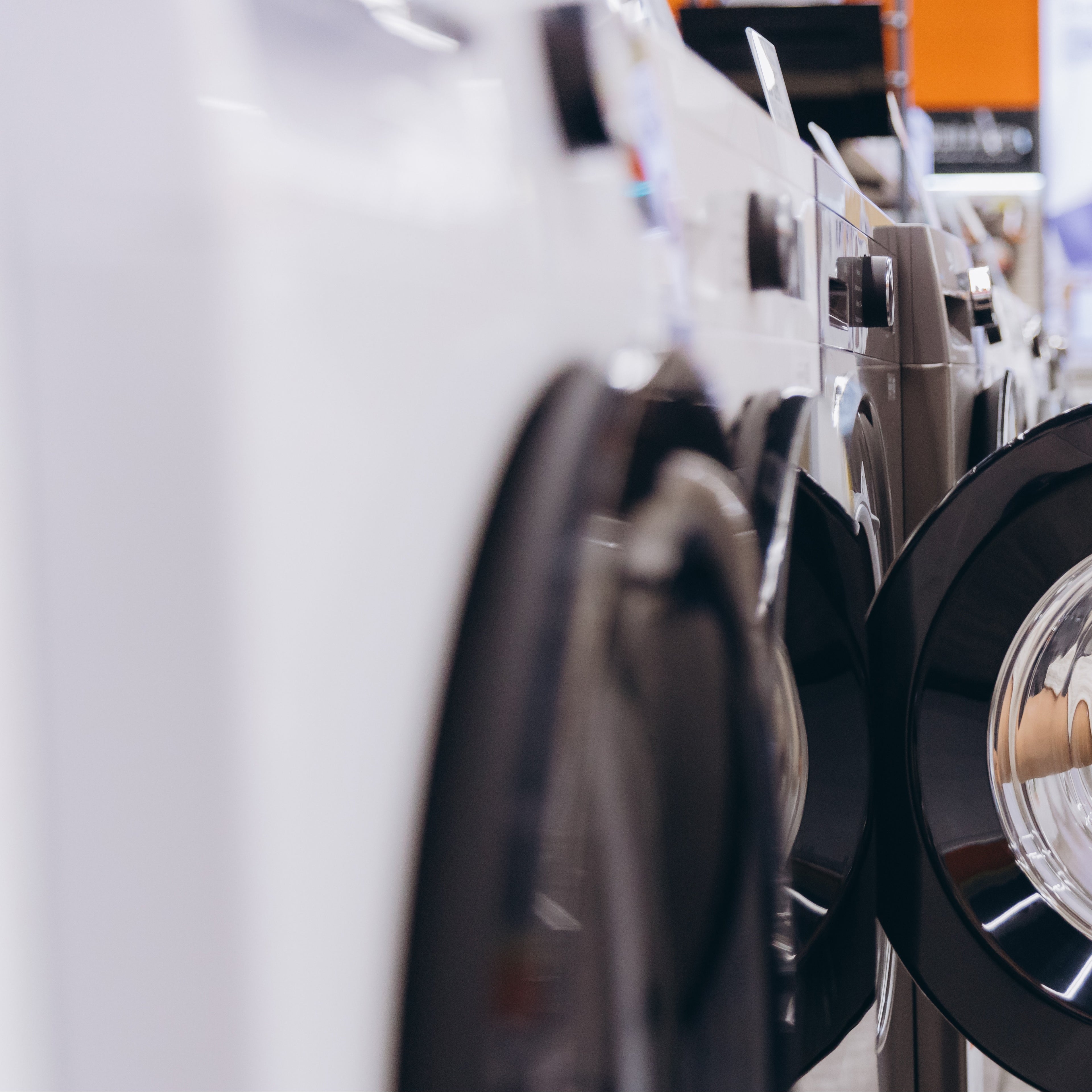 Image of washing machines in a laundry room.