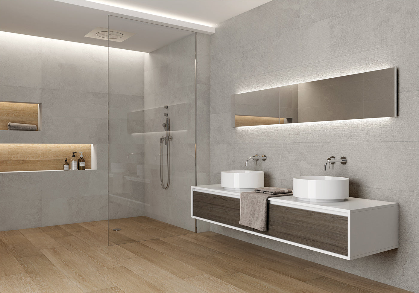 Modern bathroom with gray walls, wooden floor, and a vanity with two sinks.