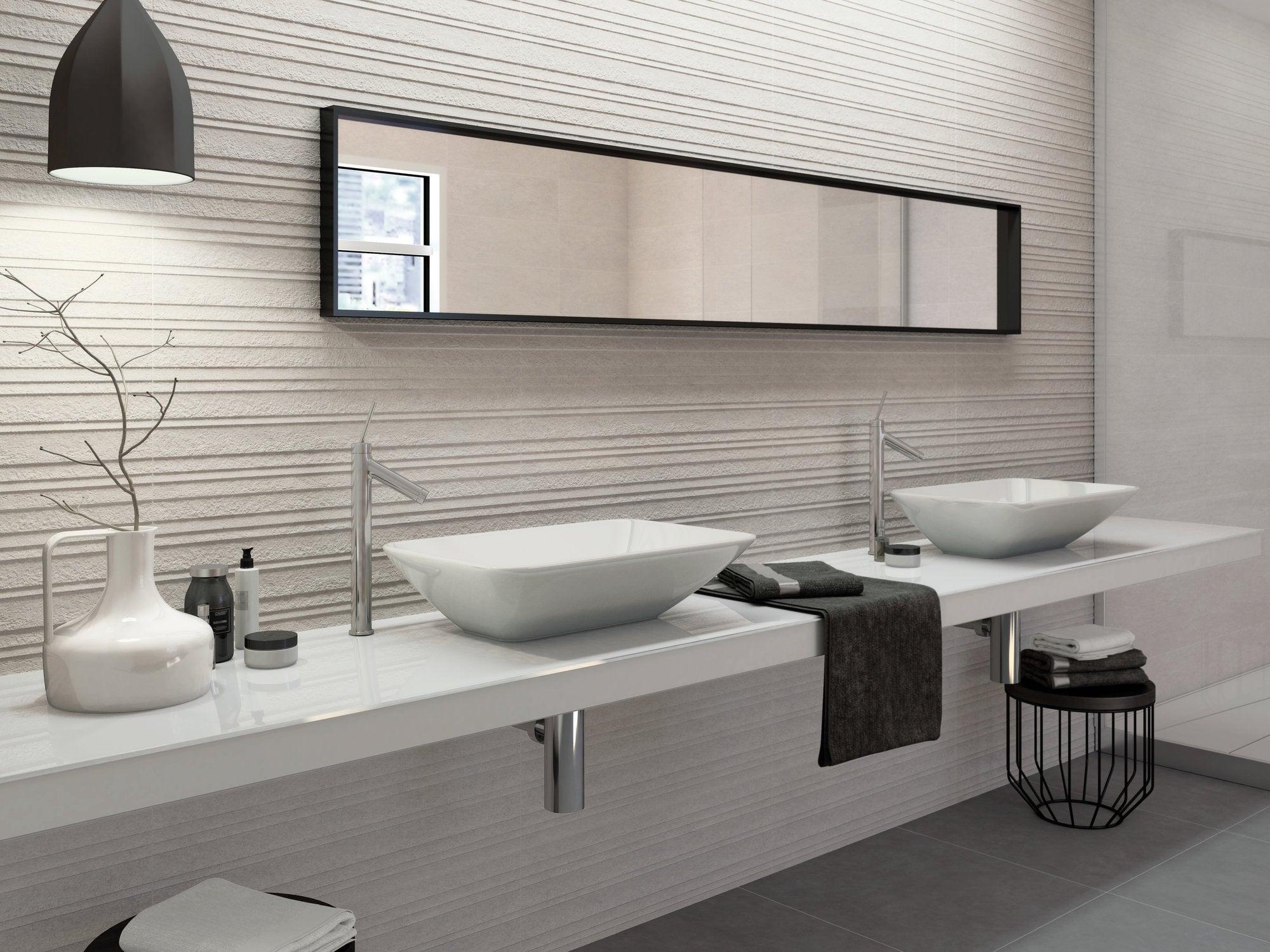 Modern bathroom with two white sinks, a large mirror, and decorative elements.