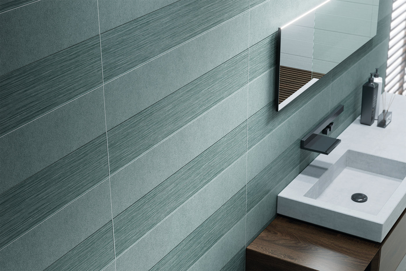 Bathroom with green tiled wall, sink, and mirror